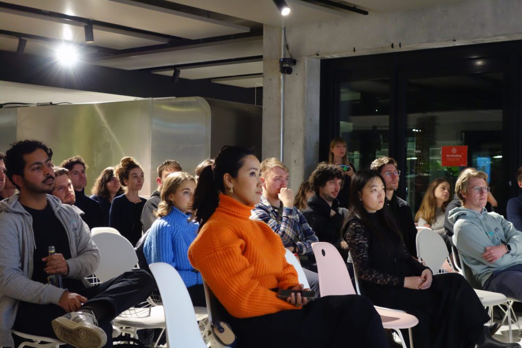 founders at the climate tech event listen avidly to the discussion