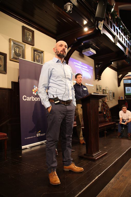Lewis Jenkins, at the front, pitches at the Cambridge Showcase day with cofounders Yubiao Niu and Phil Hunter